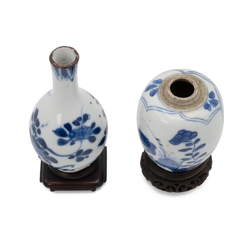 185 - TWO SMALL CHINESE BLUE AND WHITE VASES ON STANDS, KANGXI, 18TH CENTURYOne of baluster form, decorate... 