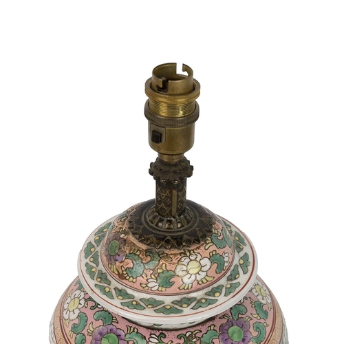 155 - AN ORIENTAL PORCELAIN VASE WITH COVER, 19/20TH CENTURYOf baluster form, on a brass base with three d... 