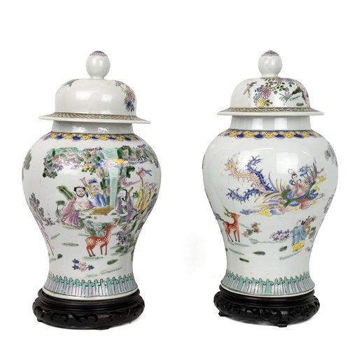 9 - A PAIR OF LARGE CHINESE FAMILLE ROSE JARS WITH COVER, 19/20TH CENTURYDecorated with the patterns of ... 