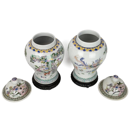 9 - A PAIR OF LARGE CHINESE FAMILLE ROSE JARS WITH COVER, 19/20TH CENTURYDecorated with the patterns of ... 