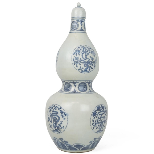 10 - A LARGE CHINESE BLUE AND WHITE DOUBLE-GOURD VASE WITH COVER, 20TH CENTURYDecorated with various styl... 