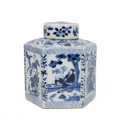 16 - A CHINESE BLUE AND WHITE HEXAGONAL TEA CANISTER, QING DYNASTYDecorated with flowers and birds as wel... 