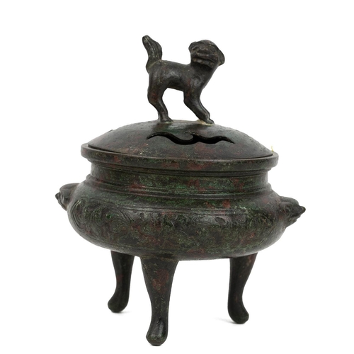 344 - A SMALL CHINESE SCHOLAR'S DESK BRONZE CENSER AND COVER, QING DYNASTYRaised on tri-feet, the body dec... 