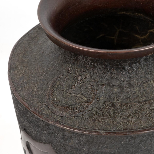 345 - A LARGE JAPANESE BRONZE VASE, MEIJI PERIODThe tapered body raised on a low foot, with everted mouth ... 