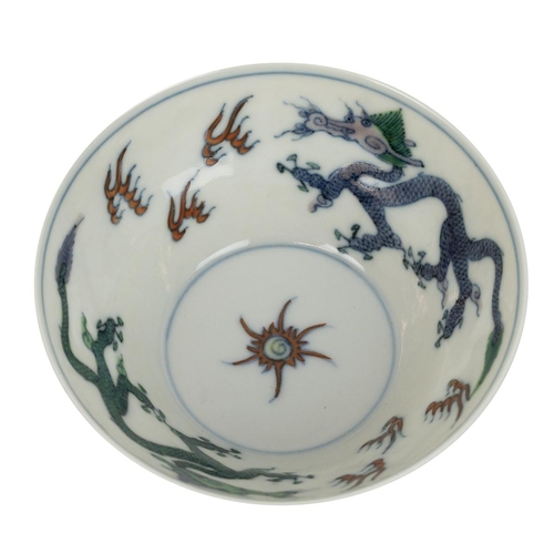 25 - A CHINESE DOUCAI PORCELAIN BOWL, YONGZHEN PERIOD, QING DYNASTYDecorated with alternating flying drag... 