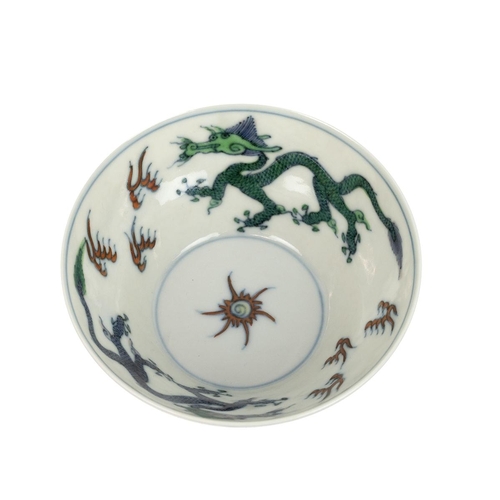 25 - A CHINESE DOUCAI PORCELAIN BOWL, YONGZHEN PERIOD, QING DYNASTYDecorated with alternating flying drag... 