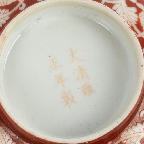 35 - A CHINESE IRON RED GLAZED BOWL, 19-20TH CENTURYFully decorated with scrolling lotus foliages on iron... 