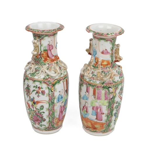 145 - A PAIR OF CHINESE FAMILLE ROSE VASES, 19TH CENTURYOf baluster shape and everted mouth rims, decorate... 