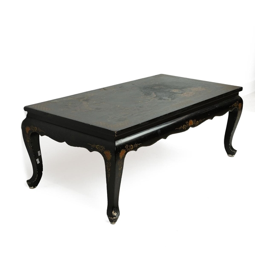 222 - A CHINESE LACQUER COFFEE TABLE.With chinoiserie decoration, the top decorated with birds flowers and... 