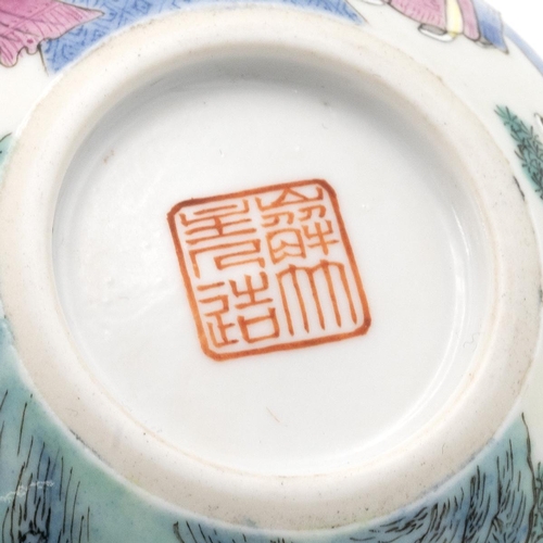 88 - A CHINESE FAMILLE ROSE TEA CUP, 20TH CENTURYDecorated with the legend 'Xi Xiang Ji' on the exterior ... 