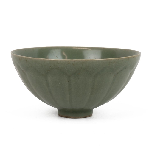 93 - A CELADON LONGQUAN KILN BOWLOf a sharp tapering form, raised from a short foot ring, decorated with ... 