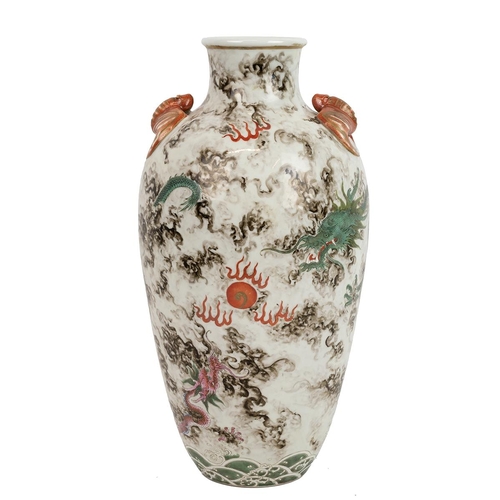 149 - A CHINESE FAMILLE ROSE VASE, 19/20TH CENTURYDecorated with flying dragons in clouds, a pair of mould... 