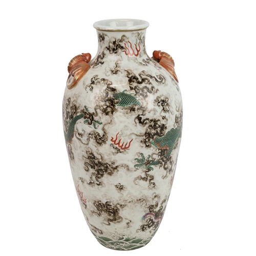 149 - A CHINESE FAMILLE ROSE VASE, 19/20TH CENTURYDecorated with flying dragons in clouds, a pair of mould... 