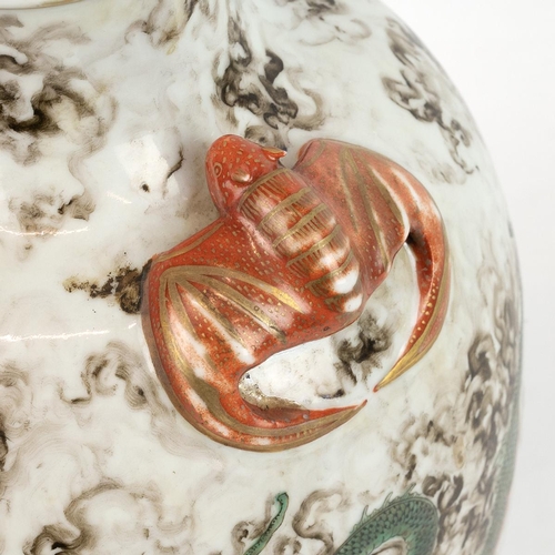 149 - A CHINESE FAMILLE ROSE VASE, 19/20TH CENTURYDecorated with flying dragons in clouds, a pair of mould... 