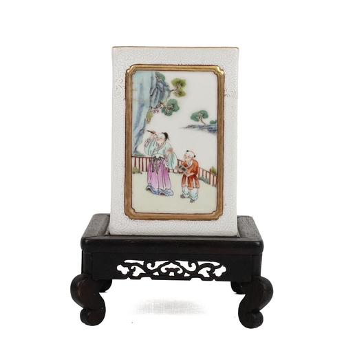 51 - A CHINESE FAMILLE ROSE PEN HOLDER WITH WOODEN STANDOf a square column form, each side decorated with... 