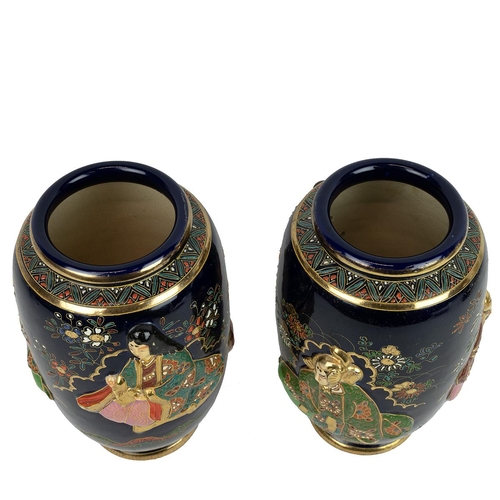 20 - A PAIR OF JAPANESE VASES, MEIJI PERIODWith everted mouth and foot rings, parcel gilt, moulded high r... 