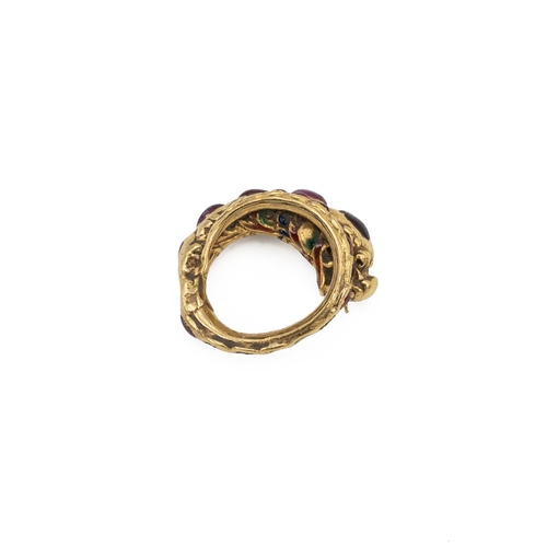 9 - Yellow metal and ruby Siam ring, early 20th Century. Set with various cabochon cut rubies, in the fo... 