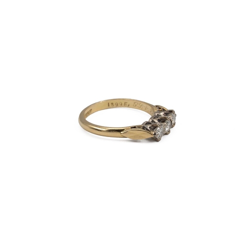 79 - Yellow metal and three-stone diamond ring, set with three brilliant-cut diamonds, each in a four-cla... 