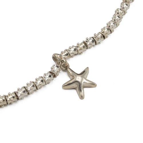 94 - Links Of London, a studded necklace with a starfish pendant, marked '925', 61 grams, boxed.