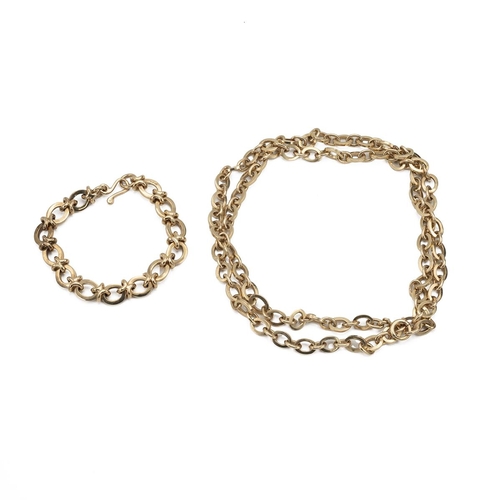 103 - 9ct gold oval link necklace, along with a similar matching bracelet, each of graduating form, 77cm l... 