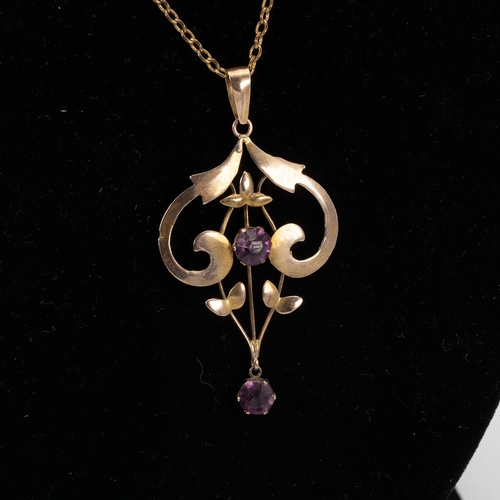 126 - Art Nouveau 9ct gold hallmarked pendant set with two amethyst with yellow metal necklace weight 1.3 ... 