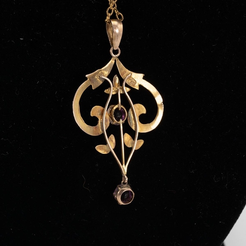 126 - Art Nouveau 9ct gold hallmarked pendant set with two amethyst with yellow metal necklace weight 1.3 ... 