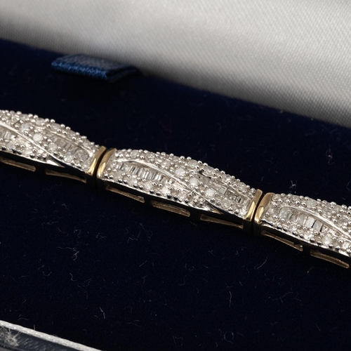 134 - 9ct gold and pave set diamond panel bracelet, set with baguette and round brilliant cut diamonds thr... 