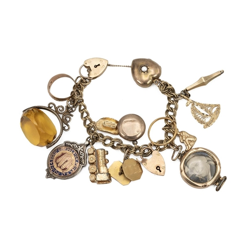 138 - Yellow metal charm bracelet, set with various charms, with 22ct gold wedding band, others marked 9ct... 