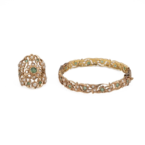 151 - Bahrain yellow metal tested 14ct gold emerald and seed pearl bracelet and ring set. The bangle with ... 