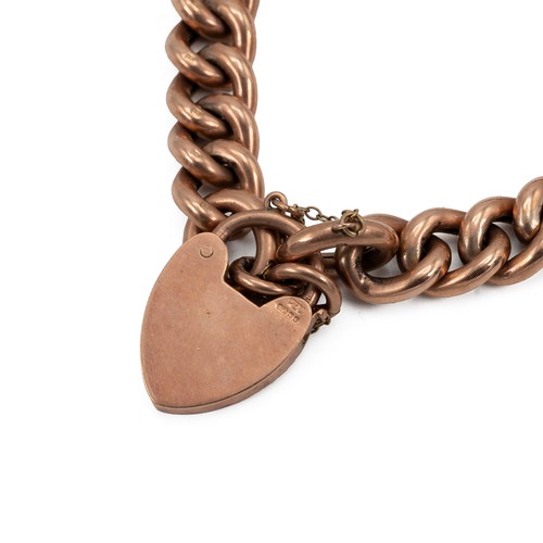 153 - 9ct gold curb link bracelet with a heart-shaped locket, 27.05 grams.