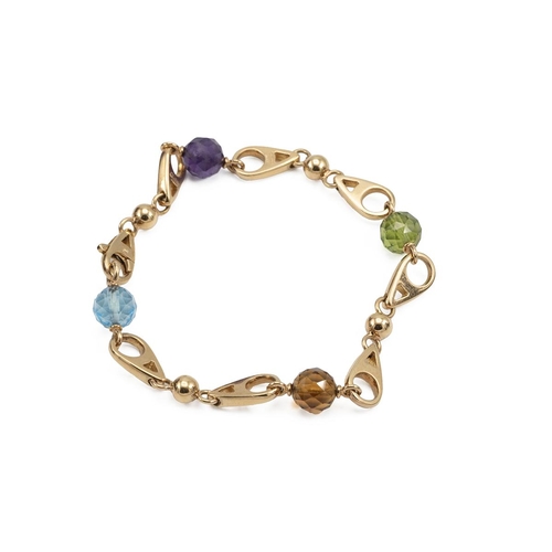 154 - Asprey's London, an 18ct gold link bracelet with four faceted spherical charms in aquamarine, citrin... 