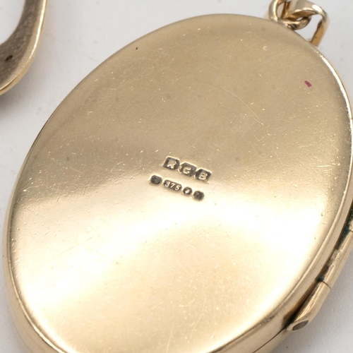 163 - 9ct gold oval locket, along with a pair of 9ct earrings, 13 grams.