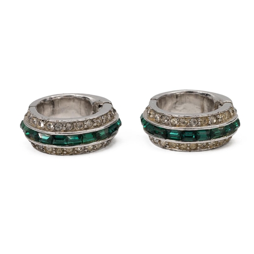 185 - Art Deco jewellery comprising two green and paste brooches and a similar pair of hooped earrings.