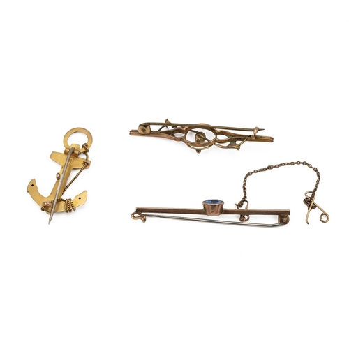 187 - Three 9ct stamped gold bar brooches one in the form of an anchor, total weight 5.4 grams.