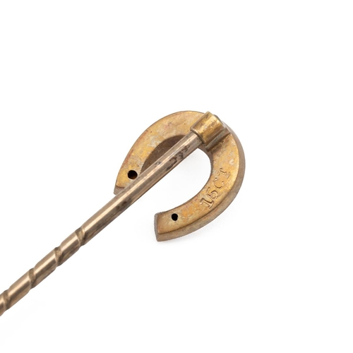 188 - Two 15ct gold hallmarked stick pins, one in the form of a horseshoe and the other set with a ruby, b... 