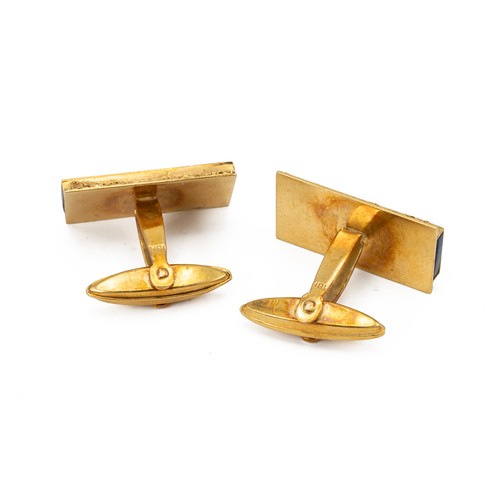 192 - Pair of yellow metal and lapis lazuli set cufflinks, stamped 18k, 14.31 grams.