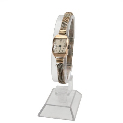 203 - Ladies Art Deco 9ct gold watch, along with a white metal panel bracelet, an enamel brooch in the for... 