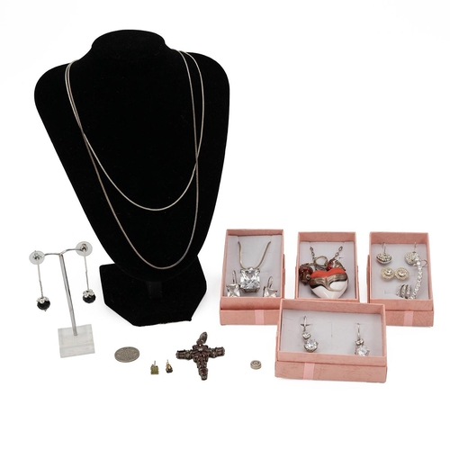 206 - Collection of silver and white metal jewellery, including pendants, necklace and other items.