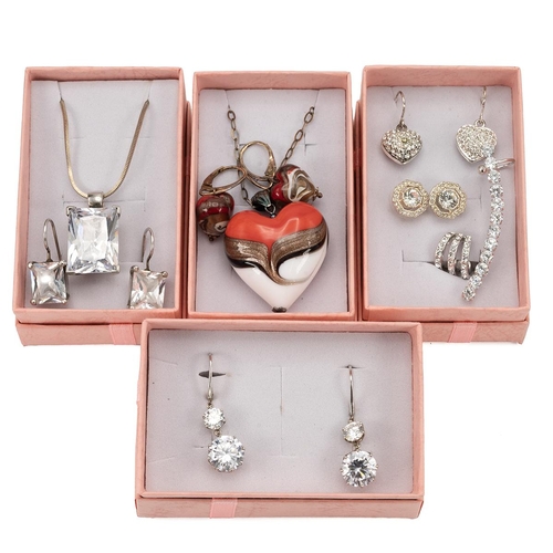 206 - Collection of silver and white metal jewellery, including pendants, necklace and other items.