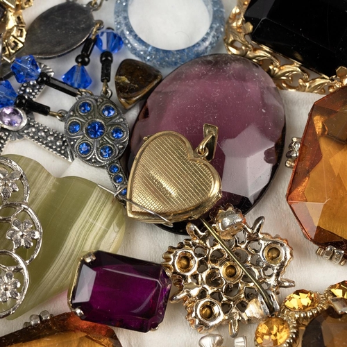 214 - Extensive collection of costume jewellery, including gem-set brooches, rings, pendants, silver charm... 