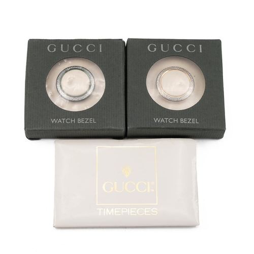 249 - Ladies Gucci 11/12 gold tone bangle watch with colour change bezels. White dial with 11 coloured int... 