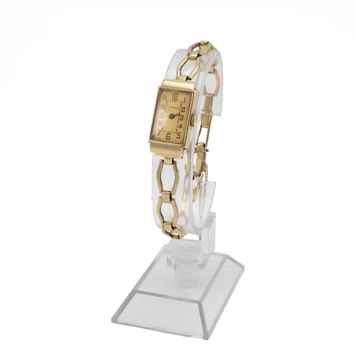 262 - Longines ladies 14ct gold Art Deco wristwatch and strap, c1940. Manual wind, 14x27mm rectangular cas... 