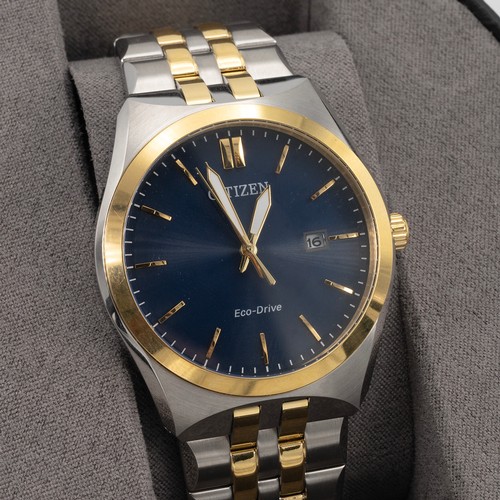 269 - 2x boxed Citizen Eco-Drive watches. One gents stainless steel with gold tone details, blue face with... 