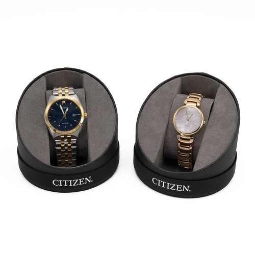 269 - 2x boxed Citizen Eco-Drive watches. One gents stainless steel with gold tone details, blue face with... 