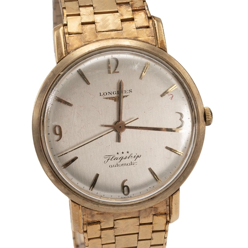 283 - Vintage gents Longines Flagship automatic 9ct gold wristwatch and strap. Silvered dial with gold bat... 