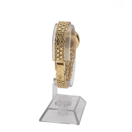 285 - Ladies 18ct gold Omega wristwatch with integrated 18ct gold chainlink bracelet strap hallmarked 750 ... 