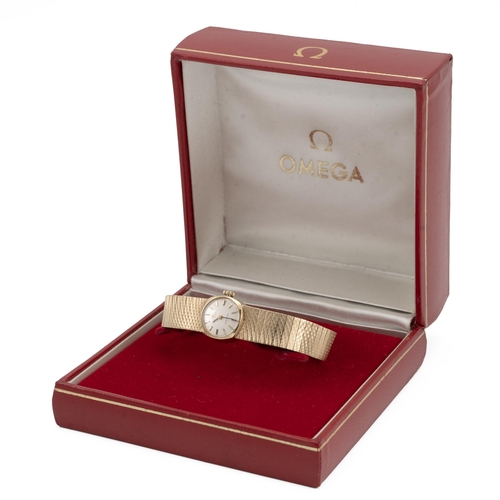 294 - Omega ladies 9ct gold hallmarked wristwatch, manual wind,round silver dial signed Omega Ladymatic ba... 