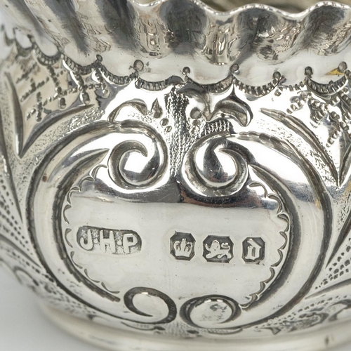 423 - A sterling silver hallmarked bowl and pierced basket, a sterling silver medallion related to the 58t... 