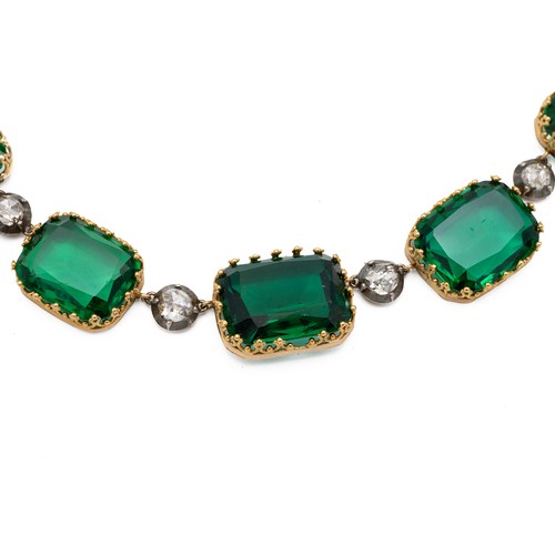 117 - Georgian style emerald green paste Riviere necklace. Yellow metal set in 14ct gold, tested, with 17 ... 