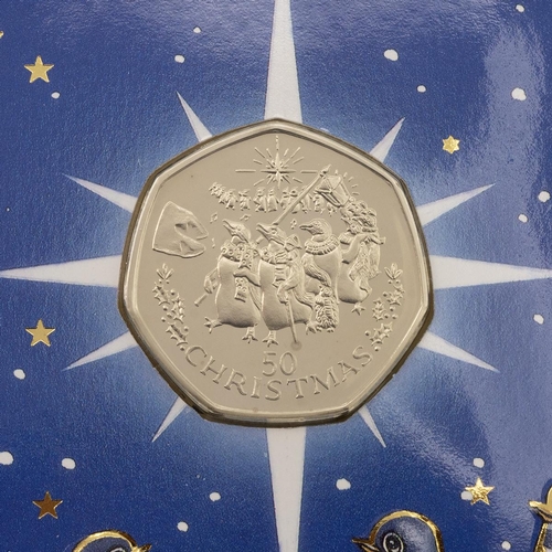 163 - Gibraltar, 1995 diamond BU Christmas 50p, Singing Penguins. Packaging: unwritten Pobjoy Mint card wi... 